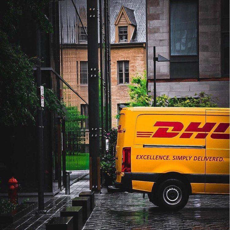 DHL courier van on a city street