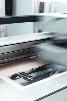 Wide-format printer running a job