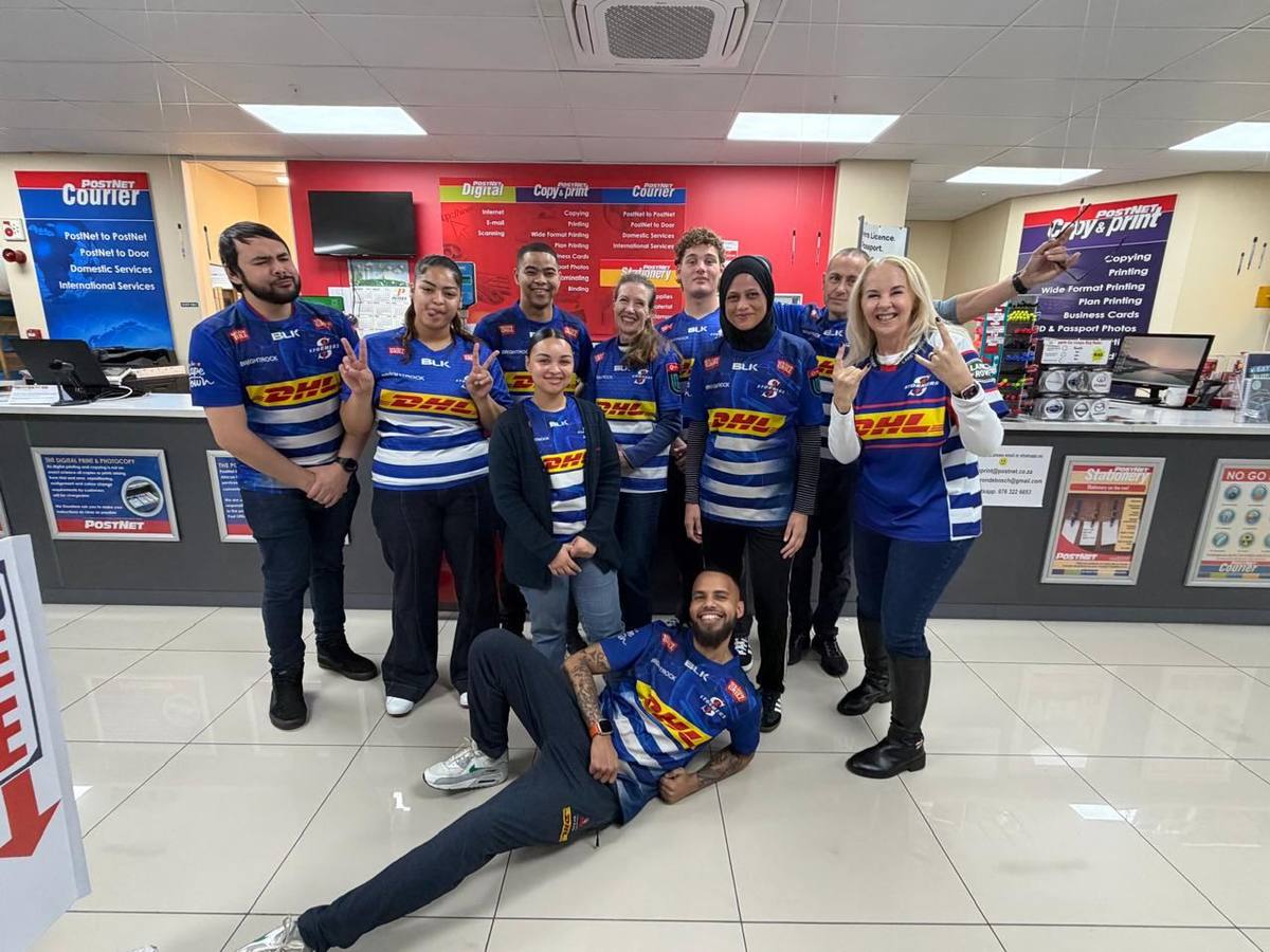 The Postnet Rondebosch team in DHL Stormers jerseys on a Friday